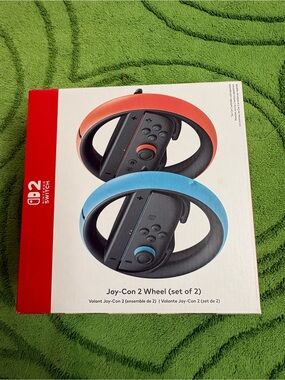 Nintendo Switch 2 Joy-Con 2 Wheel set in red and blue colors.